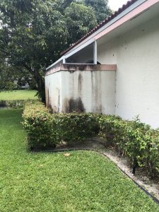 House Siding before pressure cleaning in Boynton Beach