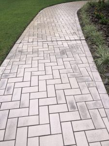 Walkway before pressure cleaning in West Palm Beach